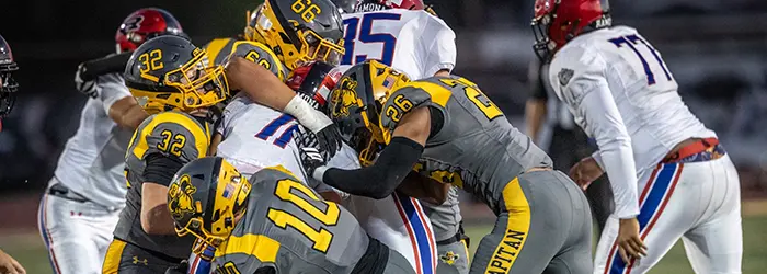 El Capitan Vaqueros Football defense making the stop